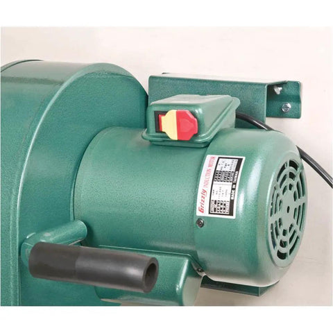 Close-up view of a 1 HP Wall Hanging Dust Collector For Woodworking Shops With A 4 Inch Inlet And A 13 And A Half Inch Dust Bag Prewired 110V.