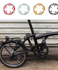 52T Aluminum Chainring Guard For Mountain Bikes 130mm BCD Crank CNC Machined Aluminum Alloy shown in multiple colors with bike