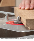 Top Shelf Rabbeting Router Bit Kit With Seven Size Precision Collars in action cutting oak wood at 1/2" depth using twin ball bearing.