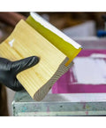 White Plastisol Screen Printing Ink, Fast Cure At 270F, 32oz Quart being spread on screen with squeegee, USA Made