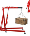 Heavy Duty 2 Ton Folding Engine Hoist 4000 LB Cherry Picker Telescopic Boom with wooden crate lifted.