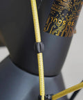 Close-up of gold braided housing on Shifter Cable Set with Braided Housing and Teflon Coated Inner Wire for Road and Mountain Bike Derailleurs