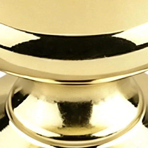 Close-up of Solid Vintage Unlacquered Brass Dome Cabinet Knobs showing polished finish and design for kitchen or bathroom installations.