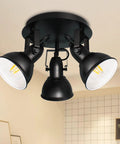 Industrial 3 Light LED Track Lighting Kit In Black with adjustable heads and round plate for modern ceiling fixture in kitchens or offices.