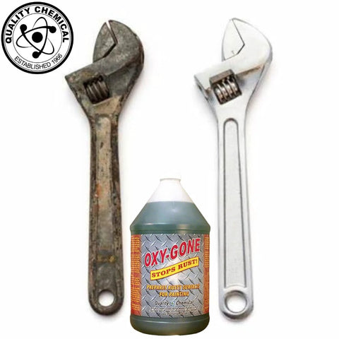OXY-GONE rust remover bottle between a rusty wrench and a polished wrench; Quality Chemical seal visible.