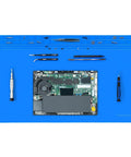 Monster Sized Extra Large Soldering Mat For Electronics Repair 27.6 By 15.7 Inches with tools and laptop on blue silicone pad