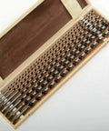 Badass Eight Piece Extra Long Auger Drill Bit Set For Woodworking crafted from heavy duty steel in a wooden storage box.