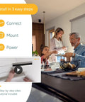Family installing Wirefree Li Ion Solar Panel Kit 2 Pack For RTS Motorized Shades And Blinds, enjoying easy setup steps.
