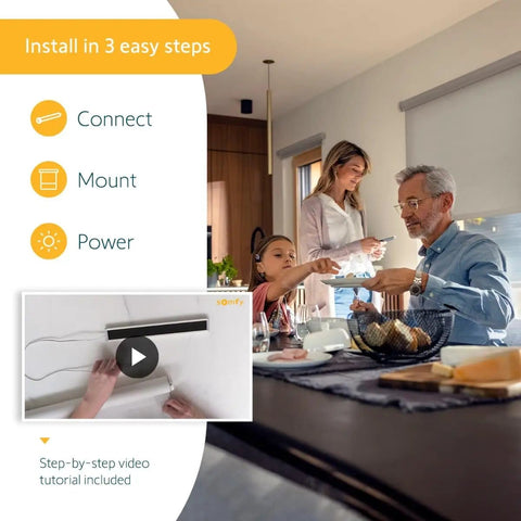 Family installing Wirefree Li Ion Solar Panel Kit 2 Pack For RTS Motorized Shades And Blinds, enjoying easy setup steps.