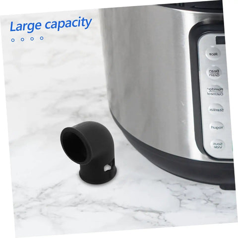 Close-up of a black silicone steam release hose beside a pressure cooker, part of 2 Pack Silicone Steam Release Hoses For Pressure Cooker And Air Fryer, High Temperature Resistant Gasket Tubes, Quick Install No Fuss Setup, Safety Valve Replacement, Keeps Pressure Steady For Juicy Even Cooking Results.