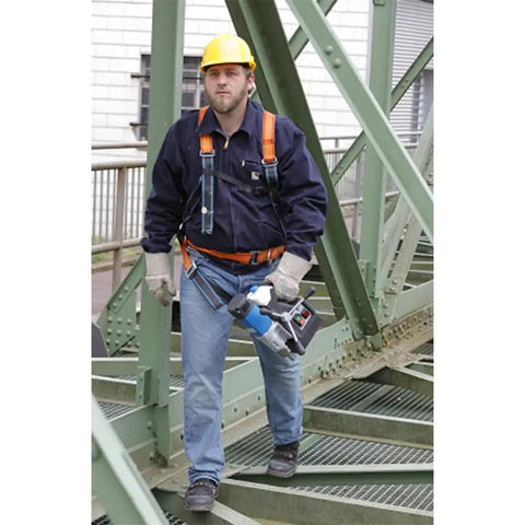 Super Lightweight Portable Magnetic Drill Press By CS Unitec MAB 100 K Compact Cordless Unit Just Weighs 21.8 lbs being carried by a worker on-site.