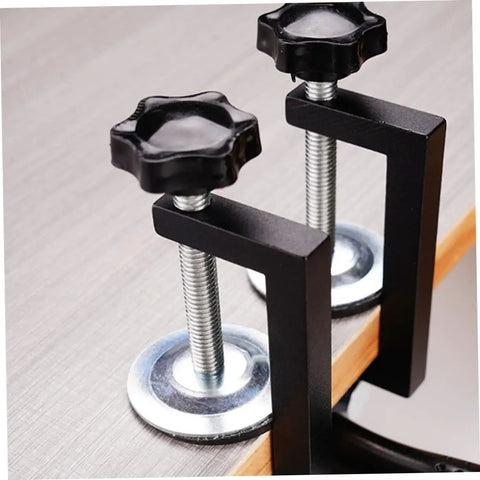 Close-up of adjustable patio sofa clips set for outdoor rattan furniture heavy duty wicker fasteners installed on table edge