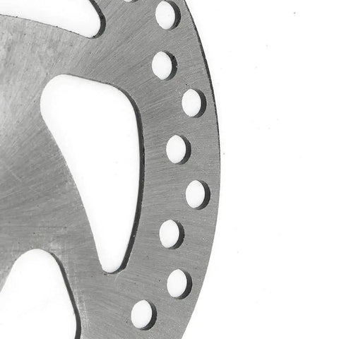 Close-up of a silver aluminum alloy rotor from the 140mm Rear Disc Brake Caliper Kit for Mini Dirt Bikes, Go Karts, Scooters, ATVs.