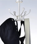 Straight Up Solid Wall Mounted Coat Rack With Five Rotating Metal Hooks, showing black hat on a hook, premium gold and white design.