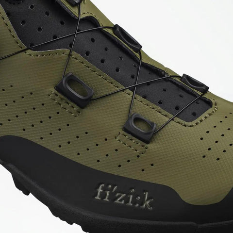 Close-up of Terra Atlas All Terrain Gravel And MTB Boa Shoes For Off Road Pedaling Built For Downcountry Laps All Mountain Adventures And Backcountry Slashing Army Green Size 12.5 showing lace system and texture.