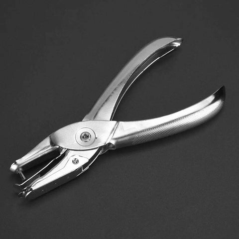 One Handed Hole Punch For Paper, 6 Sheet Capacity, 3.175mm Hole, Chrome Plated Handheld Puncher With Scrap Collector on dark background