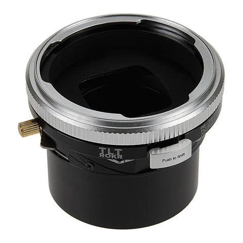Tilt Shift Lens Mount Adapter For Sony E Mount Using Pentacon 6 Kiev 60 Lenses, Delivers 20mm Shift, 10 Degree Tilt, And 360 Degree Rotation, Built Tough For Pro Level Architectural, Product, And Landscape Photography. Black metal tilt-shift lens mount adapter with silver ring and shift lever