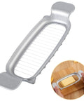 Heavy Duty Real Deal Butter And Cheese Slicer With Precision Stainless Steel Wires Ergonomic Grip in silver for cutting butter.