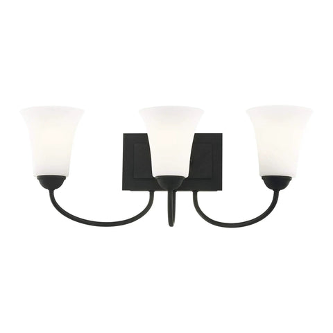 Ridgedale 3 Light Bath Vanity Fixture in Matte Black Finish with transitional design and satin opal white glass shades.