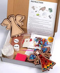 DIY Mosaic Kit For Grownups With Feather Bird Cat And Heart Designs Christmas Gift in open box with tiles, grout, and instructions.