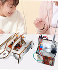 Kids assembling Hands On Telegraph Model Kit For Kids And Students, Fun Wood Craft DIY Science Experiment on a table
