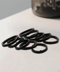 Replacement Heavy Duty Rubber Washers For Spinlock Dumbbell Nuts 1 Inch Fit 25mm O Rings scattered on surface
