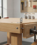 Heavy Duty Stainless Steel 90 Degree L Bracket For Furniture Reinforcement on wooden workbench corner with tools in background