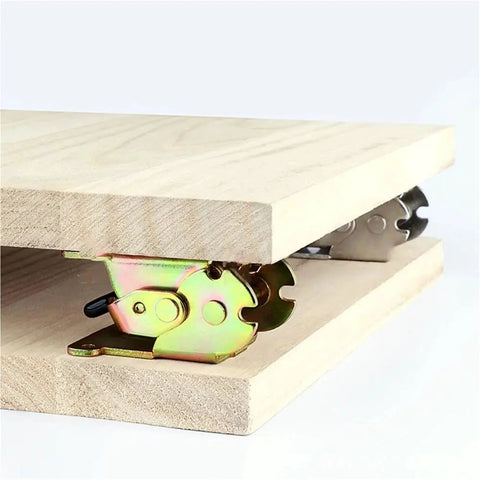 Folding table hinges (4 pcs) in colored zinc installed between wood boards; 180° foldable with screws