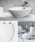 Soft Close Toilet Seat With Chrome Hinges And Wood Seat, Secure Metal Mount, Round White, displayed with bathroom decor