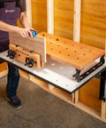 Handy Bench Portable Woodworking Workbench With Moxon Vise, 16x32 solid beech benchtop on adjustable steel base brackets in use.