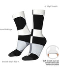 Upgrade Your Fit With Black And White Piano Grid Print Socks For Men And Women Moisture Wicking Polyester Crew Socks, shown from the side.