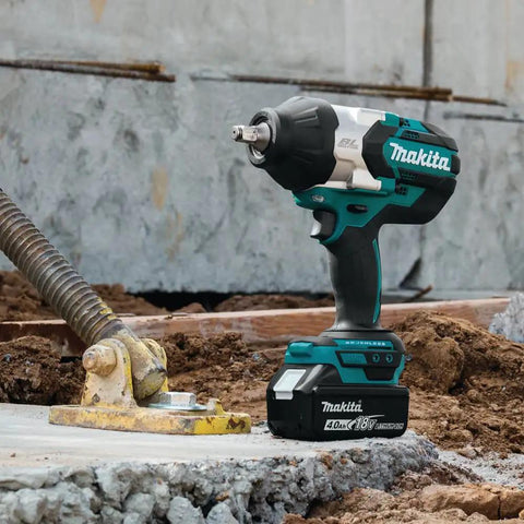 Beefy 18V Brushless Cordless Impact Wrench Half-Inch Square-Drive Tool Only With 740 Ft-Lbs Fastening Torque And 1,180 Ft-Lbs Nut-Busting Torque resting on construction site