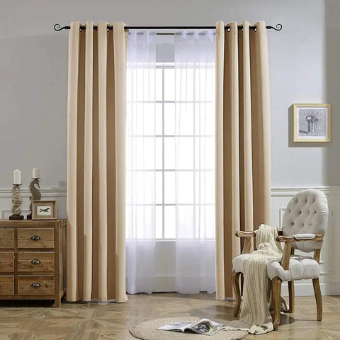 Two Panels Biscotti Beige Blackout Curtains 52 Inches By 95 Inches, Triple Weave Microfiber Grommet Top installed in room.