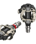 Assioma Pro MX1 Upgraded Single Sided Power Meter Pedals Bundle with extra SPD cleats and multi-tool, showing aluminum pedals