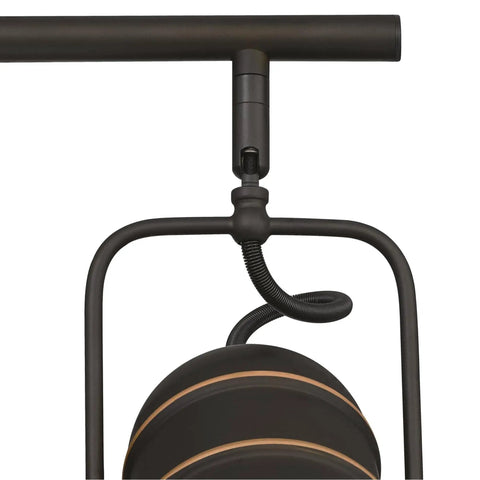 Close-up of Boswell Vintage-Style Four-Light Indoor Track Light Kit in oil-rubbed bronze with metal shade highlights.