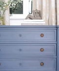Blue dresser with brass knobs finished with Finishing Wax Top Coat For Furniture And Cabinets Use On Interior Walls And Home Decor Odorless