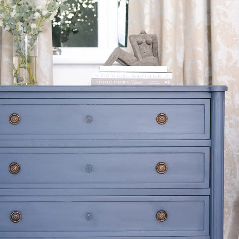 Blue dresser with brass knobs finished with Finishing Wax Top Coat For Furniture And Cabinets Use On Interior Walls And Home Decor Odorless