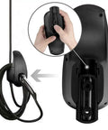 Slick Wall Mount Charging Cable Organizer For Tesla With Beefy Chassis Bracket And Tight Grip Power Cord Holder For Model 3 Model Y Model S Model X Garage Setup Matte Black showing user installing power cord.