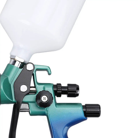 Professional Pneumatic HVP Spray Gun With 1.3 Mm Nozzle And 600 Ml Cup showing adjustable flow knobs and paint cup.