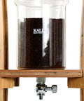 Kickback Ready Dutch Cold Brew Coffee Maker 1500ml Wooden Tower Iced Coffee Pitcher showcasing ground coffee in the clear container.