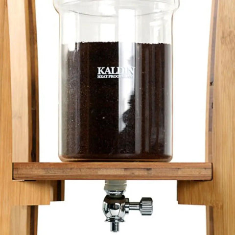Kickback Ready Dutch Cold Brew Coffee Maker 1500ml Wooden Tower Iced Coffee Pitcher showcasing ground coffee in the clear container.