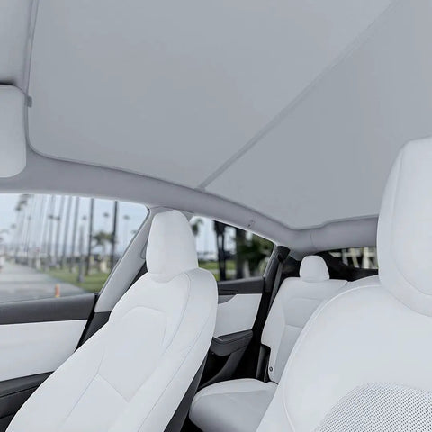 Tesla Model Y Roof Sunshade Full Blackout With Graphene Enhanced UV Coating And Silver Reflective Layer installed interior view