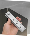 Hand holding 360 Degree Heavy Duty Stainless Steel Pivot Hinges For Hidden Doors With Slick Operation And Concealed Invisible Hinge System