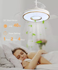 42 Inch Smart Ceiling Fan With Remote And Lights, Modern Chandelier Style, installed above a sleeping person, white brass finish
