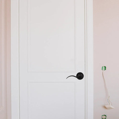 Quiet Operation Matte Black Door Lever Handle With Silent Technology And Wave Style Privacy Lock on white door