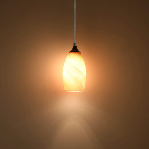 Three Pack Indoor Mini Pendant Lights For Kitchen Island In Polished Nickel With Hand Blown Orange Glass Shades glowing against wall