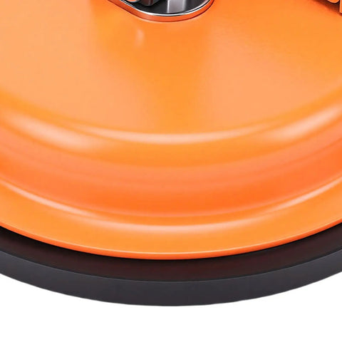 Close-up of Heavy Duty Floor Gap Fixer And Puller Tool With 180 Lb Suction, Ergonomic Handle, focused on orange suction cup base.