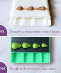Comparison of round bead maker for polymer clay, white tool with smooth surface vs green tool with rough surface, showing bead results.