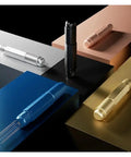 Top Shelf Telescopic WDT Tool For Espresso Distribution With 8 Bonus Stainless Steel Needles in various colors on metallic surfaces.