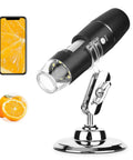 Wireless Handheld Digital Microscope for Kids and Adults, 50x to 1000x Magnification, 360 Degree Rotating Stand, Compatible With iPhone iPad Android Phones and Tablets, Portable, Great for Learning and Exploration. Black handheld microscope on rotating stand with phone view